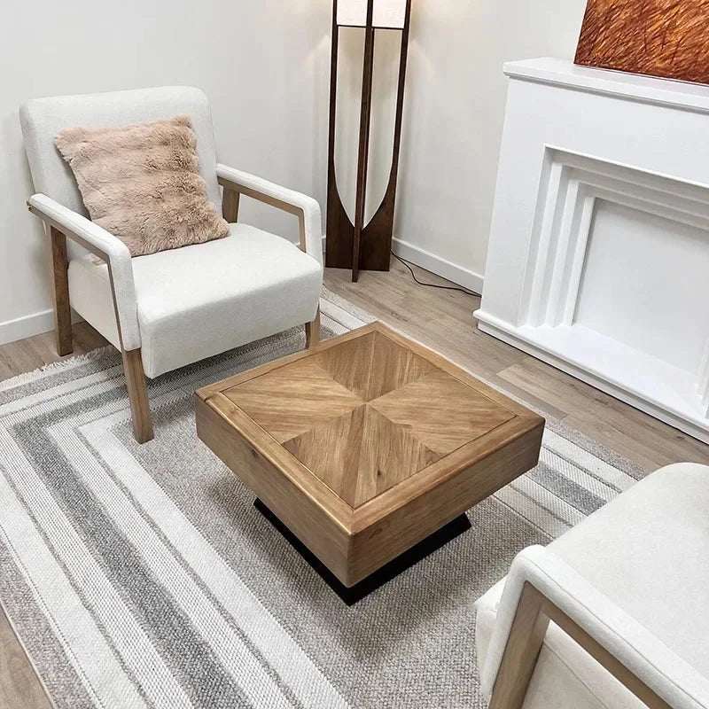 Stylish Nisu Home Coffee Table with a geometric design, set in a modern living room with armchairs