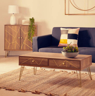 Orsina Coffee Table with Two Drawers and Golden Legs in a Modern Living Room Setting