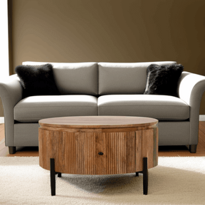 Verty Furniture Round Wooden Coffee Table with Storage, Complementing a Grey Sofa in Living Room