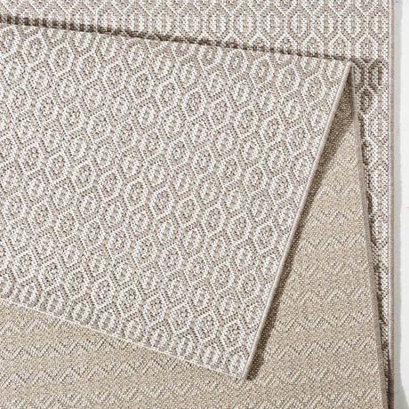 Coin Rug from The Rugs featuring a modern design in neutral tones, ideal for stylish interiors