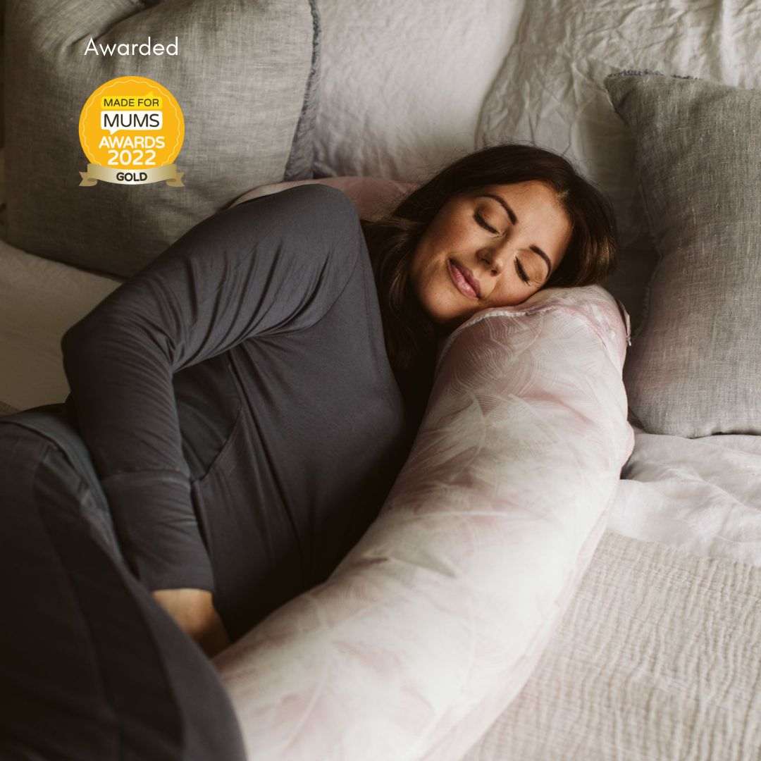 BellaMoon 3-in-1 Comfort Pillow providing support for sleeping and relaxation on a cosy bed