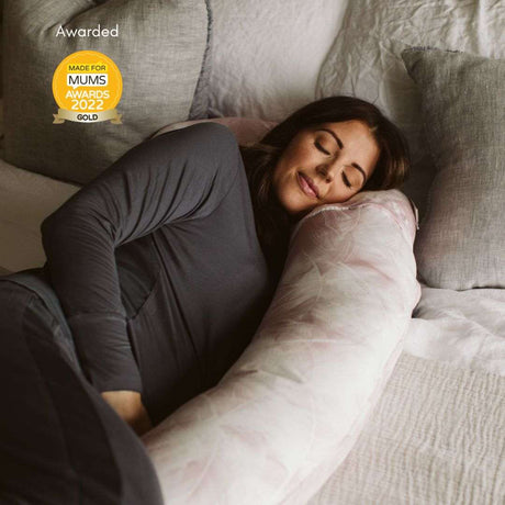 BellaMoon 3-in-1 Comfort Pillow providing support for sleeping and relaxation on a cosy bed