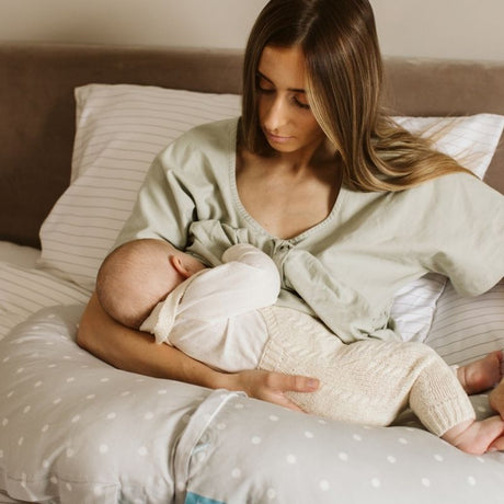 BellaMoon 3-in-1 Comfort Pillow for nursing, supporting mothers and babies with soft polka dot fabric