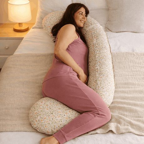 BellaMoon 3-in-1 Comfort Pillow designed for supportive sleep and relaxation on a bed