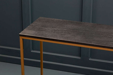 Orsina Console Table with a sleek dark surface and gold metal legs, perfect for modern interiors