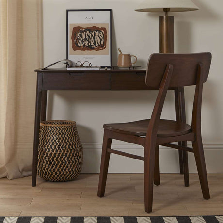 Fishe and Lilly Console Table with a chair, decorative art print, and stylish lamp in a modern setting
