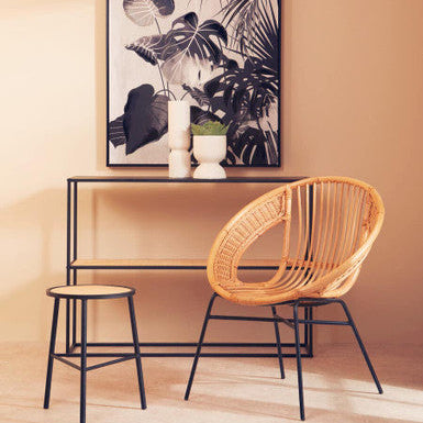 Orsina Console Table with Minimalist Design, Complemented by Rattan Chair and Stylish Decor