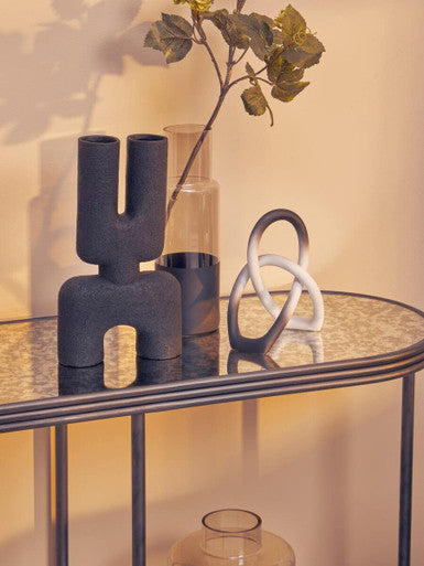 Stylish Orsina Console Table with Decorative Vases and Sculptures for Modern Home Decor