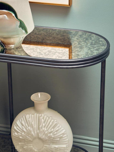 Orsina Console Table with a mirrored top and elegant vase decoration for stylish interiors