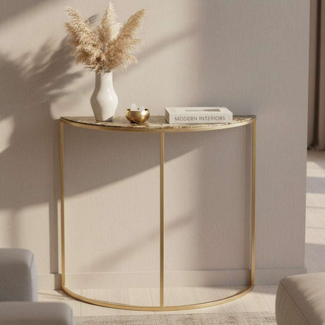 Elegant Orsina Console Table with a sleek gold frame and marble top, perfect for modern interiors