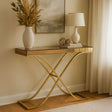 Elegant Orsina Console Table with Golden Frame and Glass Top, Stylishly Decorated with Vase and Lamp