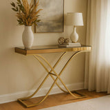 Elegant Orsina Console Table with Golden Frame and Glass Top, Stylishly Decorated with Vase and Lamp