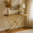 Elegant Orsina Console Table with Golden Frame and Glass Top, Stylishly Decorated with Vase and Lamp