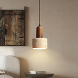Modern pendant light with a beige shade and wooden details, ideal for stylish interiors