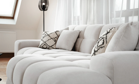 Stylish Corner Sofa in Light Grey Fabric with Decorative Cushions for Modern Living Spaces