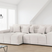 Modern Corner Sofa in Soft Beige Fabric with Plush Cushions for Stylish Living Rooms