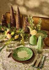 Beautiful Casa by Josephine Jenno cotton tablecloth adorned with floral patterns, set for an elegant dining experience