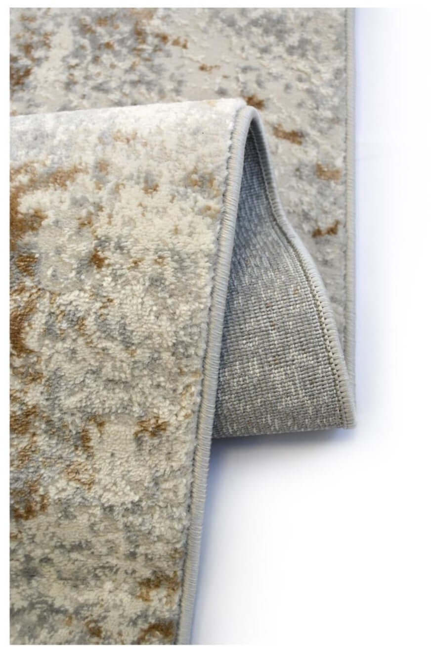 Close-up of the Cream Ochre Rug showing soft texture and stitched edges for durability