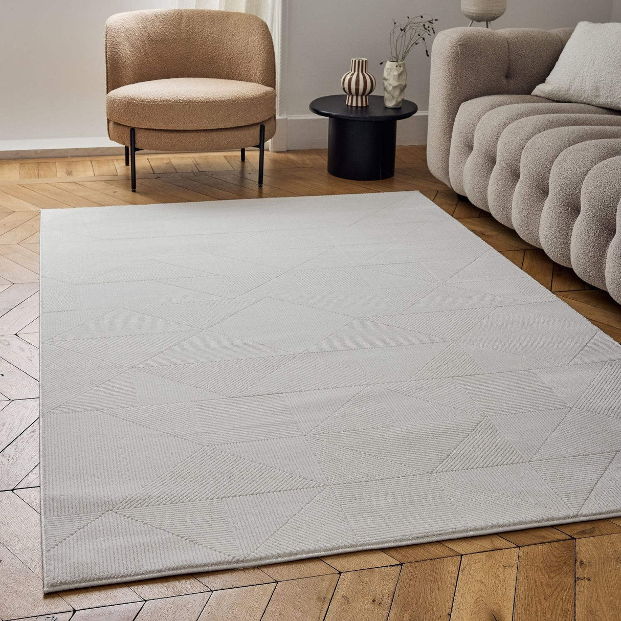 Stylish cream rug with geometric patterns, perfect for modern living spaces and enhancing decor