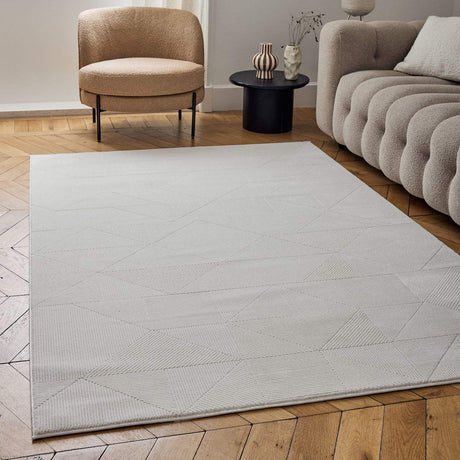 Stylish cream rug with geometric patterns, perfect for modern living spaces and enhancing decor