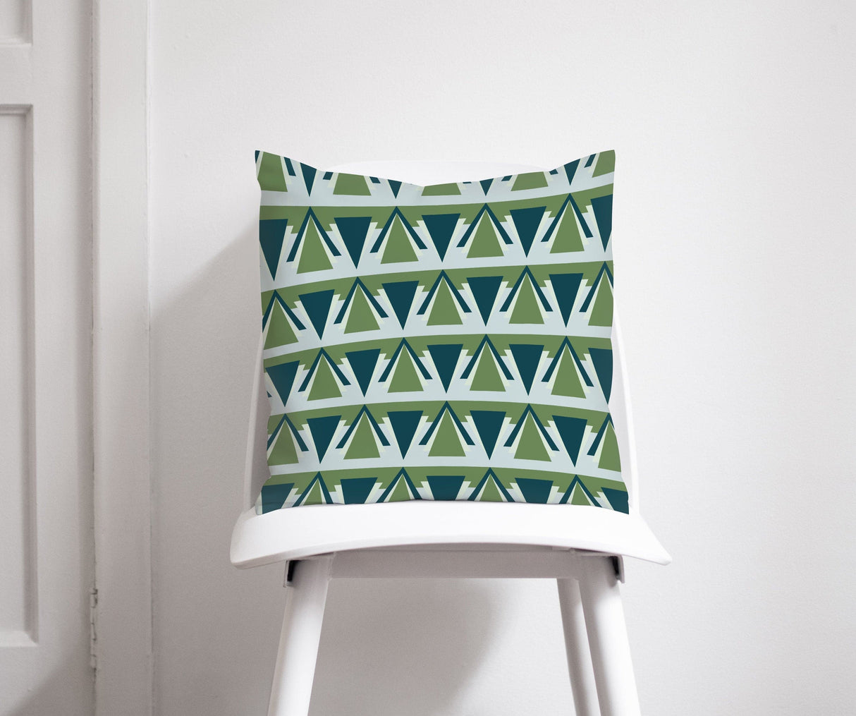 Shadow Bright decorative cushion with a modern geometric pattern in green and blue tones