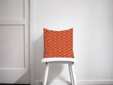 Shadow Bright Colourful Cushion with Geometric Design on a White Chair
