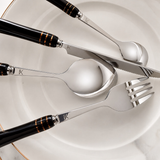 KitchBoom Cutlery Set featuring elegant stainless steel utensils with stylish black handles