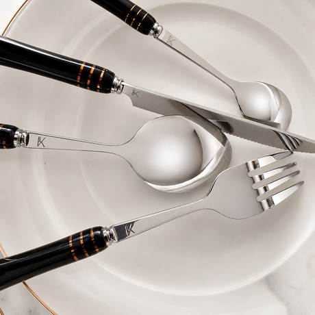 KitchBoom Cutlery Set featuring elegant stainless steel utensils with stylish black handles
