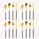 KitchBoom Cutlery Set in gold and grey, featuring forks, spoons, and knives for elegant dining