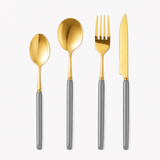 KitchBoom Cutlery Set featuring gold utensils with grey handles for stylish dining
