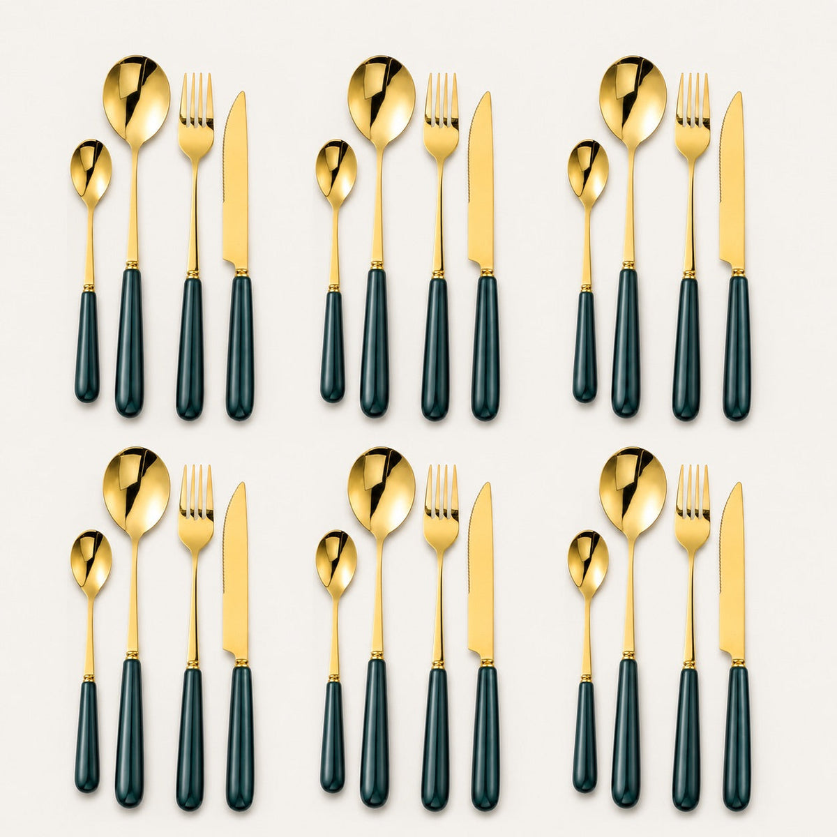 KitchBoom Cutlery Set in gold and black, featuring forks, knives, and spoons for elegant dining