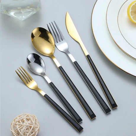 Stylish Nisu Home Cutlery Set in gold and black for elegant dining experiences