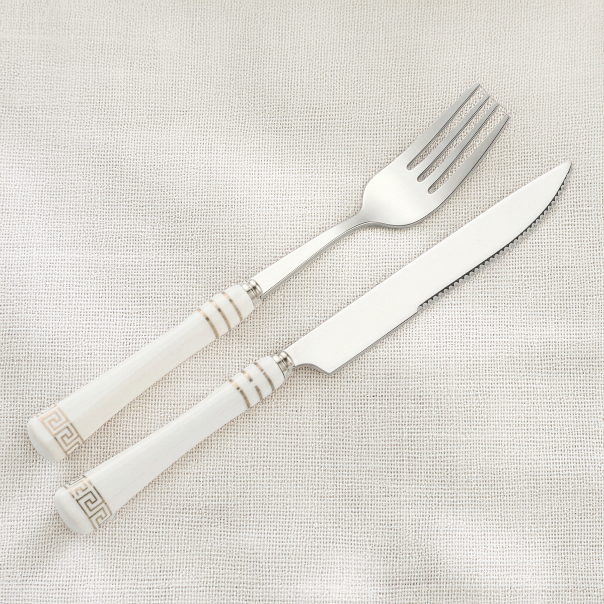KitchBoom Cutlery Set with Elegant White Handles and Decorative Detailing for Stylish Dining
