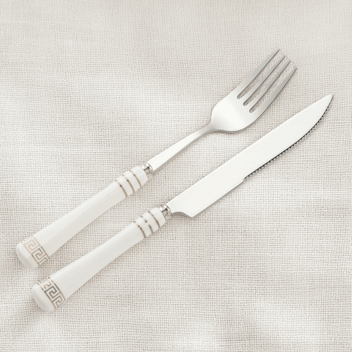 KitchBoom Cutlery Set with Elegant White Handles and Decorative Detailing for Stylish Dining