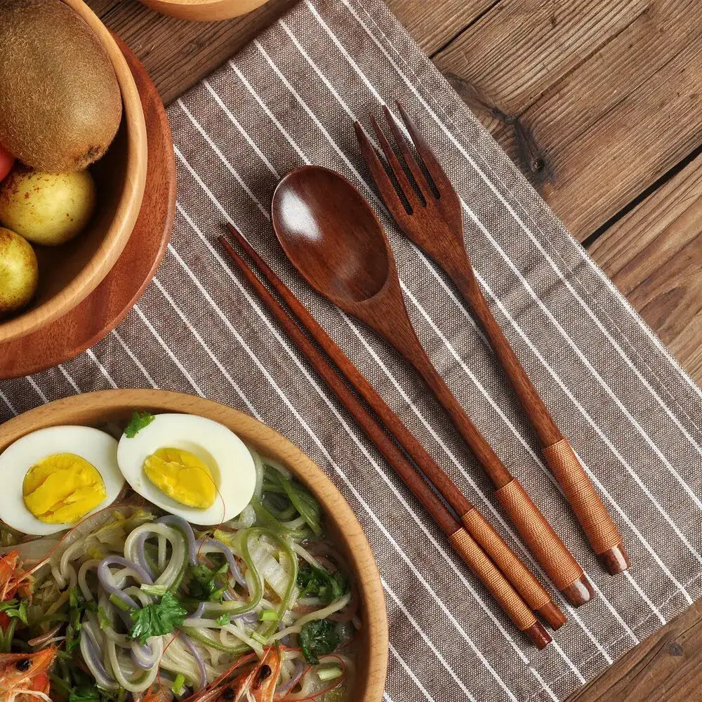Nisu Home Cutlery Set featuring wooden chopsticks, fork, and spoon for elegant dining