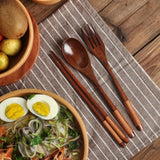 Nisu Home Cutlery Set featuring wooden chopsticks, fork, and spoon for elegant dining