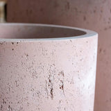 Jobu Home Cylinder Planter in a textured pink finish for modern home decor