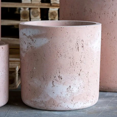 Pink Cylinder Planter with a textured surface for stylish indoor plant display