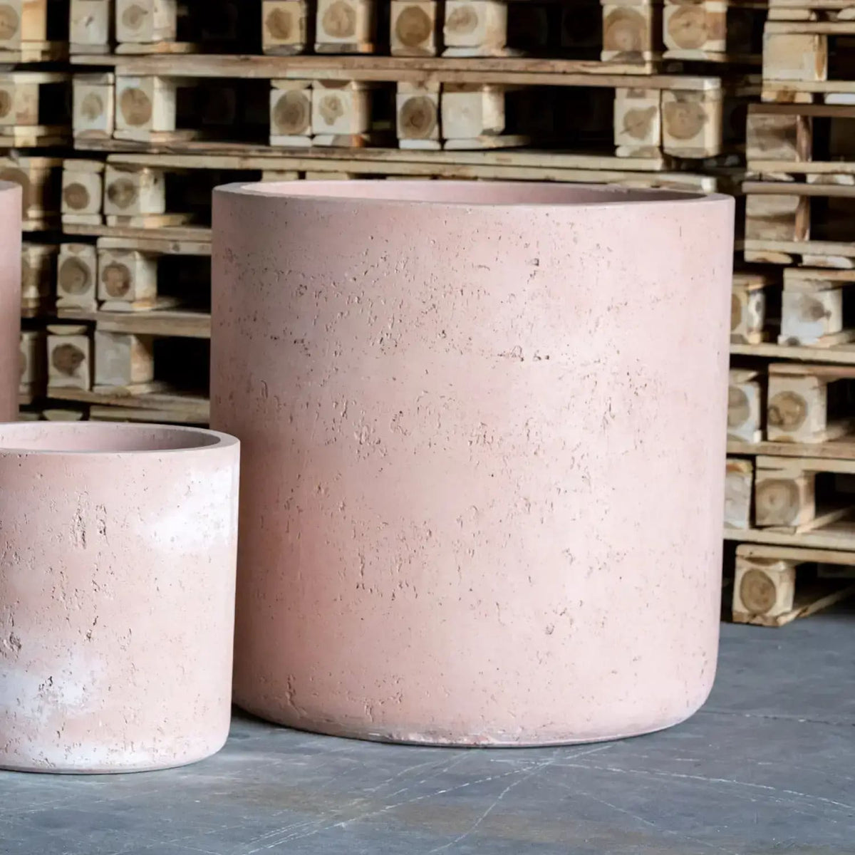 Jobu Home Cylinder Planter in Pink, ideal for indoor and outdoor plants, featuring a sleek modern design