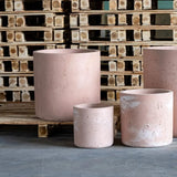 Set of pink Jobu Home cylinder planters in various sizes, ideal for indoor and outdoor plants