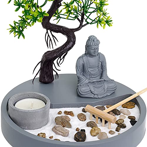 Elegant candle holder set with a Buddha statue, pebbles, and a miniature zen garden