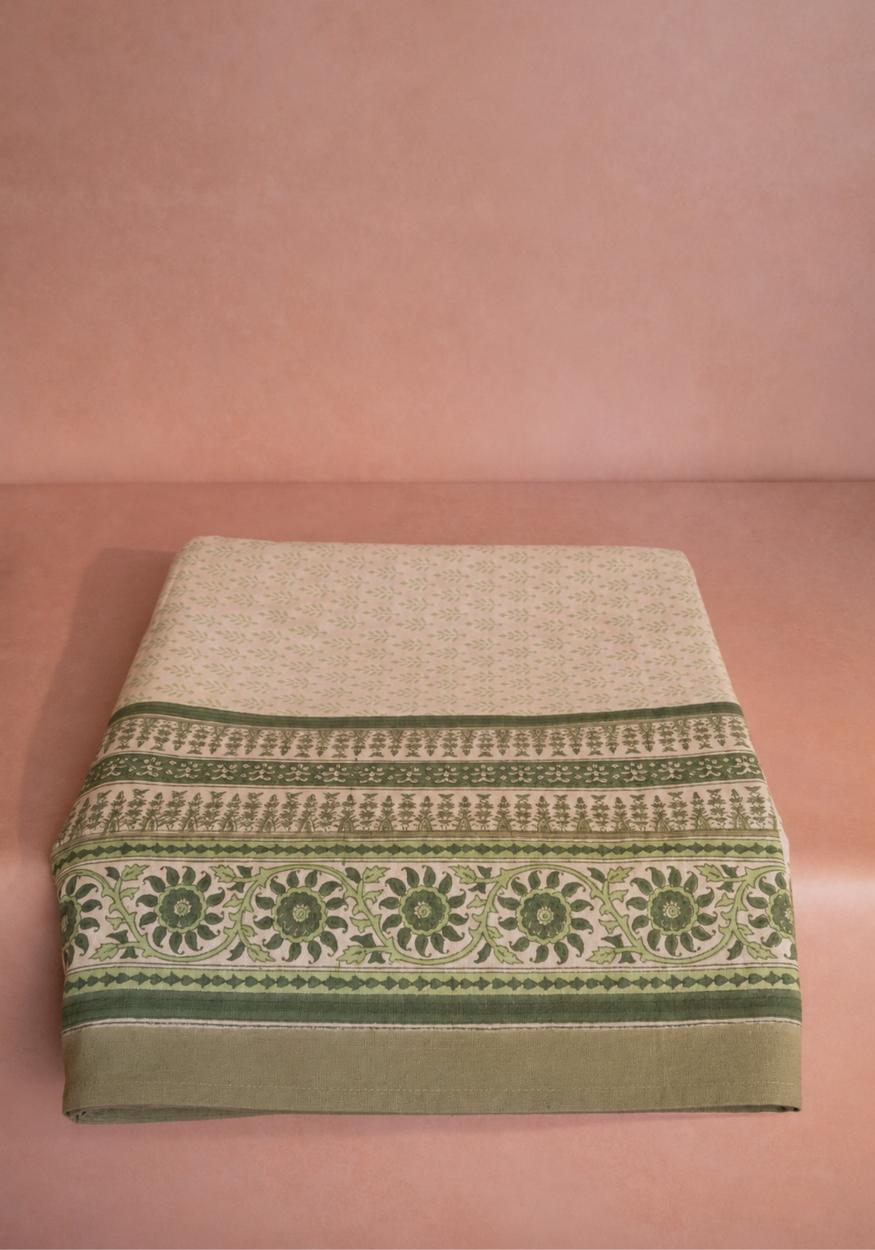 Elegant Casa by Josephine Jenno tablecloth with intricate green and beige floral design