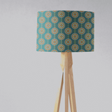 Stylish lampshade by Shadow Bright with a geometric pattern on a wooden tripod lamp base