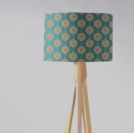 Stylish lampshade by Shadow Bright with a geometric pattern on a wooden tripod lamp base