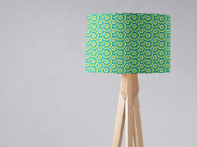Shadow Bright colourful lampshade with a modern circular pattern on a wooden lamp base