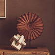 Unique Orsina sculpture featuring textured design on a stylish display stand for modern decor