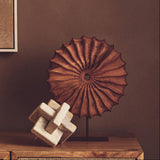 Unique Orsina sculpture featuring textured design on a stylish display stand for modern decor