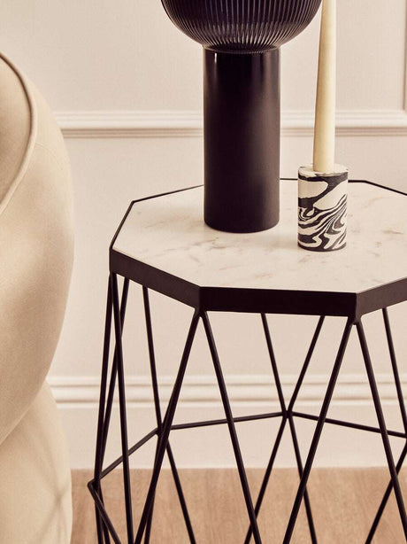 Orsina Side Table with a stylish geometric design and marble top, perfect for modern interiors