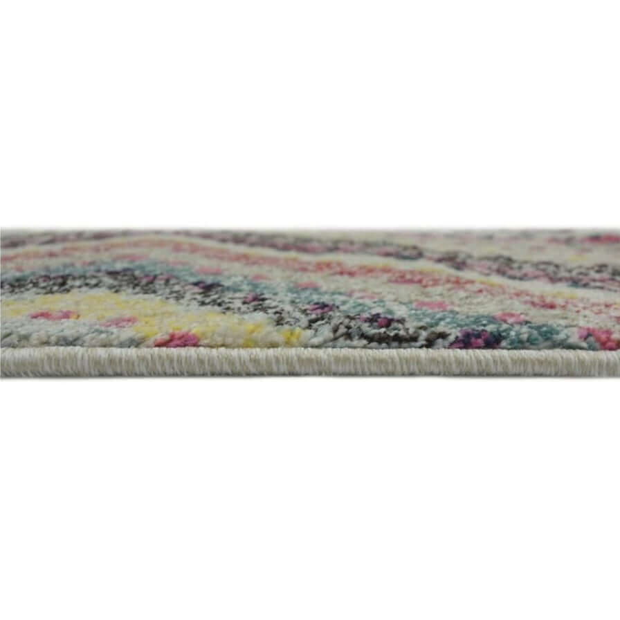Side view of a soft Diamond Rug featuring a colourful geometric pattern for stylish home decor