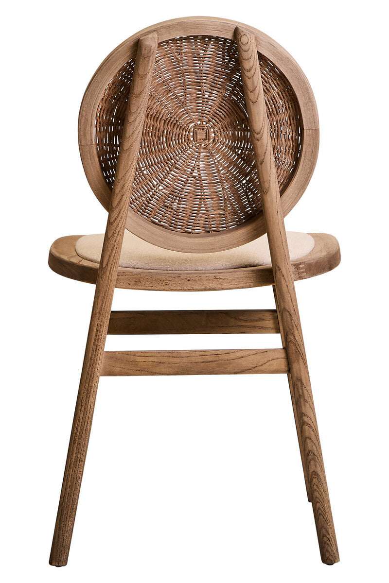 Orsina Dining Chair with a woven backrest and wooden frame designed for modern dining spaces